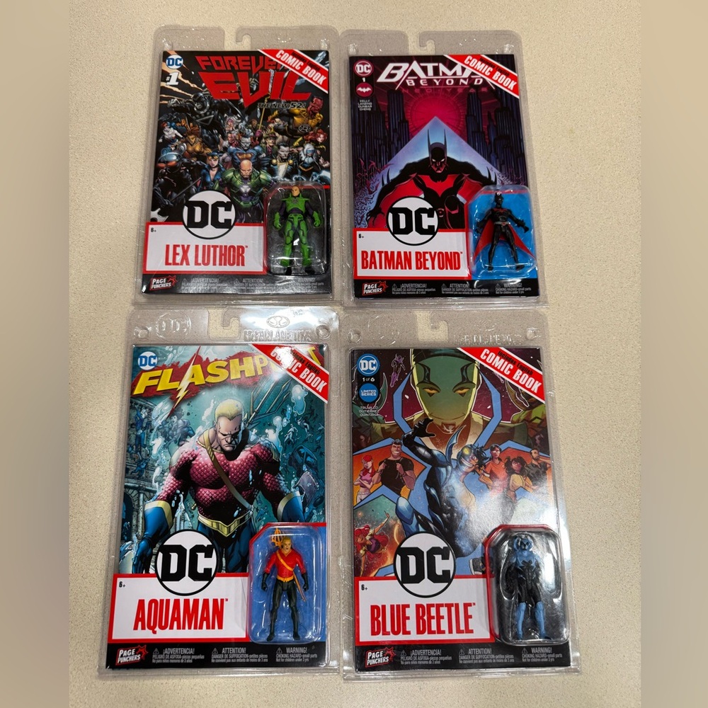 4 DC comic books with 3” figurine Batman, Aquaman, Lex Luther, Blue Beetle